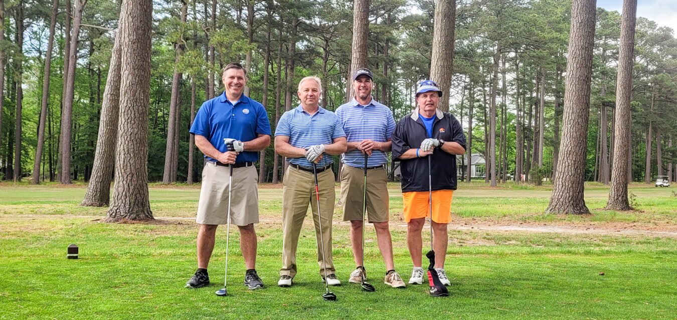 A group of golfers at the Shore Fest Golf Tournament in Melfa, Virginia.