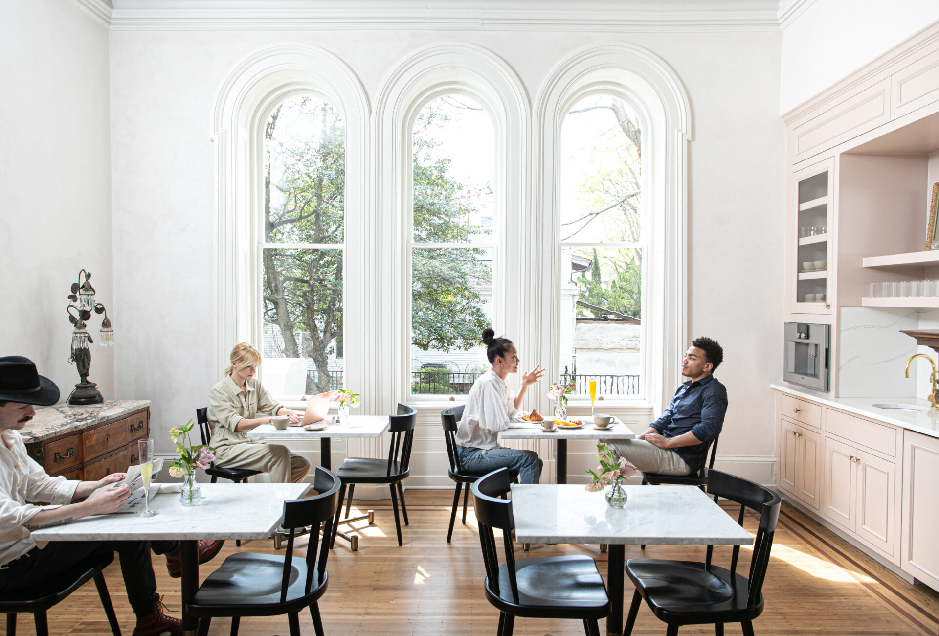 Guests enjoy their morning coffee in the Heights House parlor