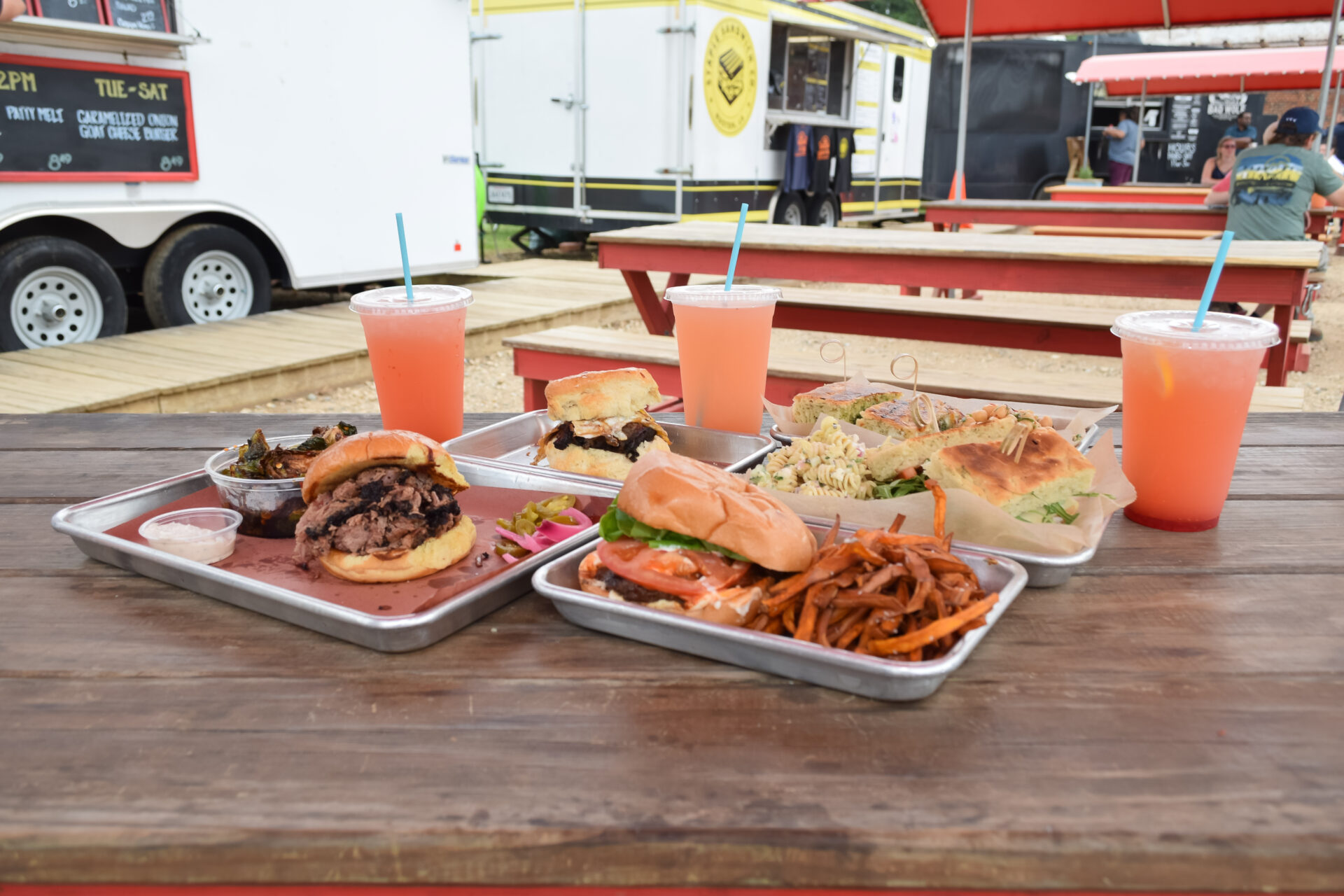 Table of food at the Heard Freighthouse Food Park in Ruston, Louisiana.