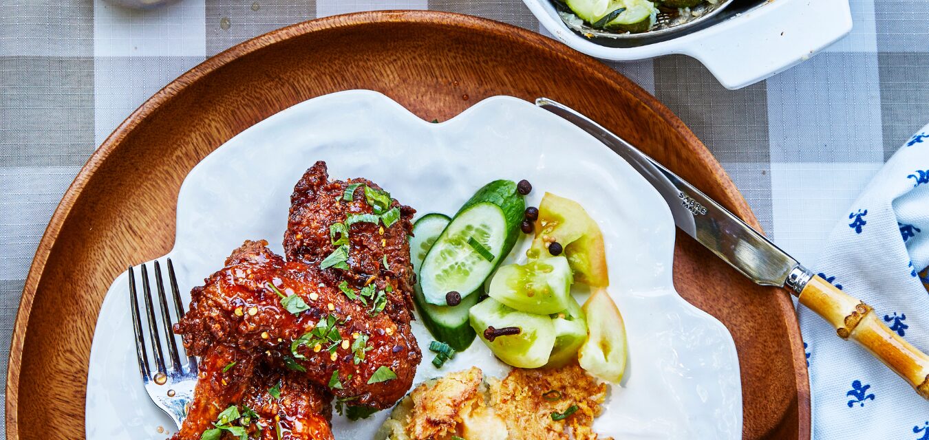 hot honey chicken on a white plate