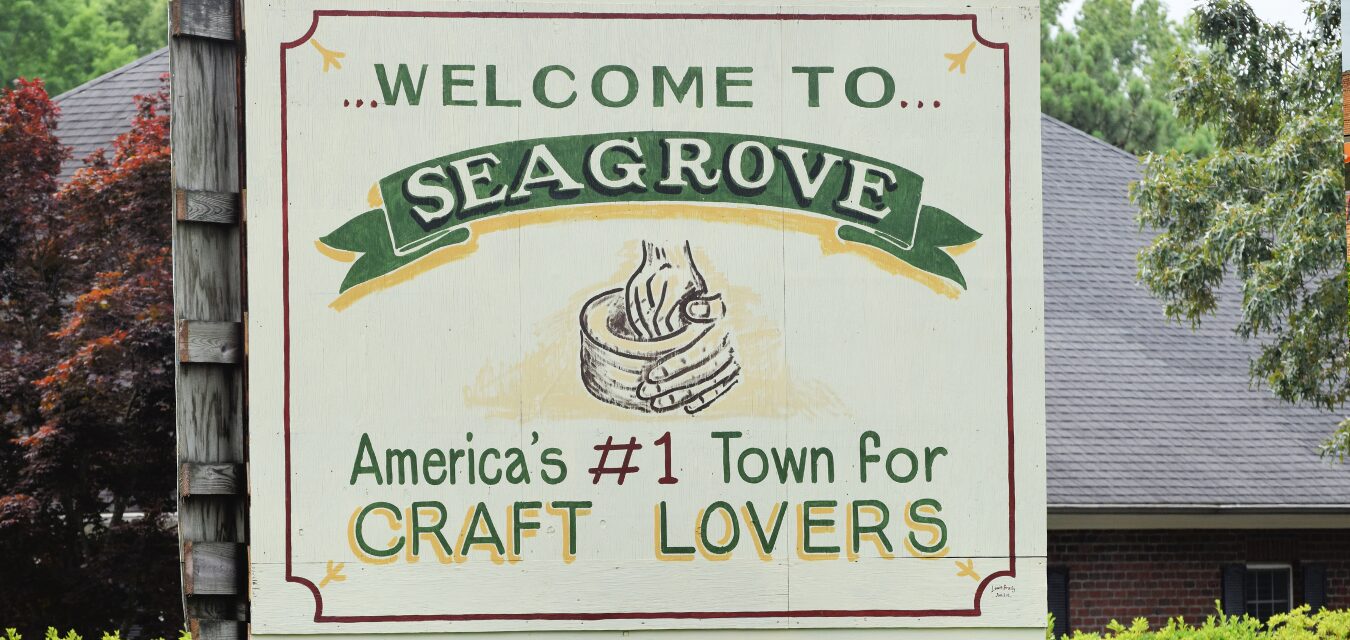 A sign that reads "Welcome to Seagrove, Americas #1 town for craft lovers"