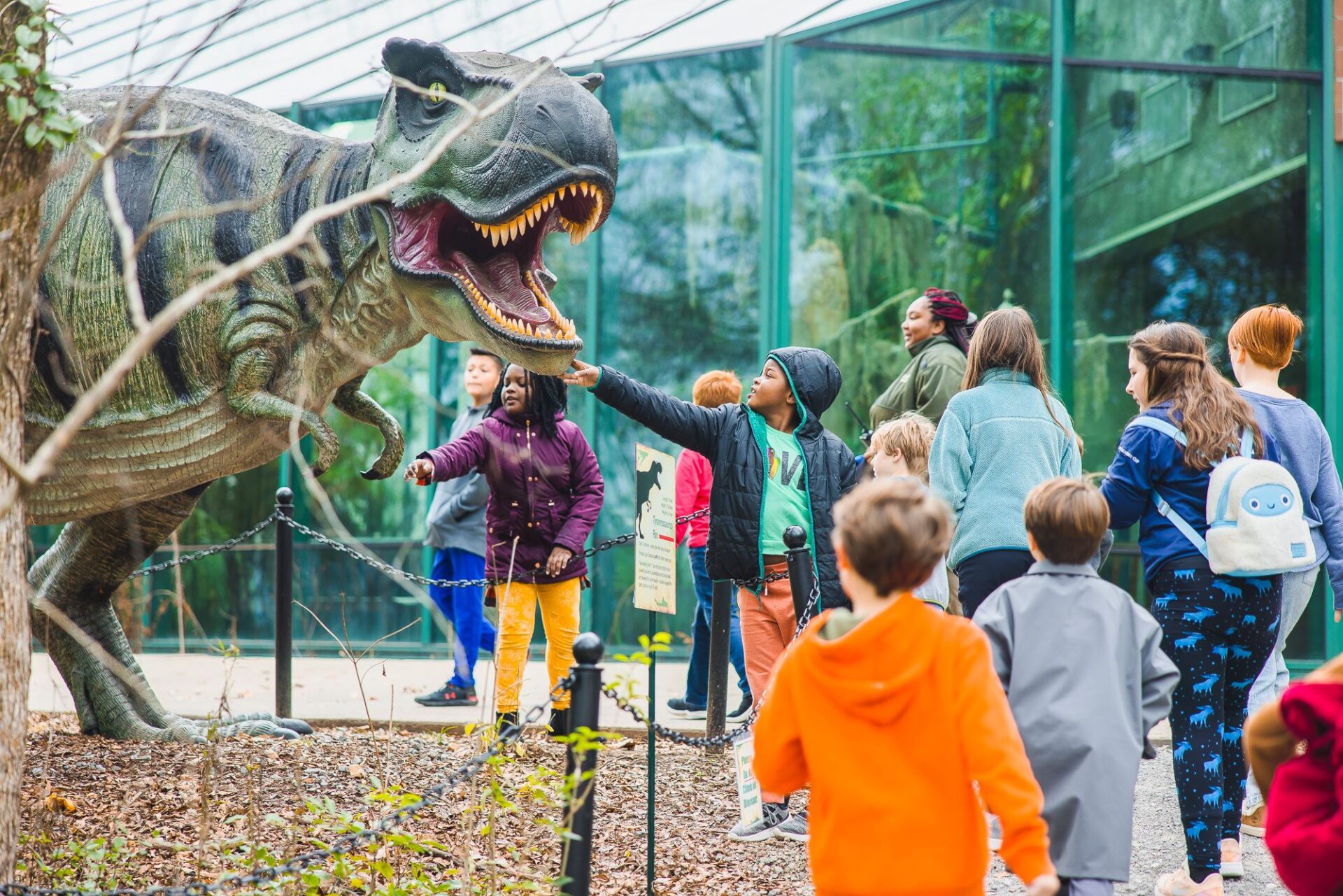 Children point at a dinasaur at the Mississippi Museum of Natural Science in Jackson, Mississippi. 