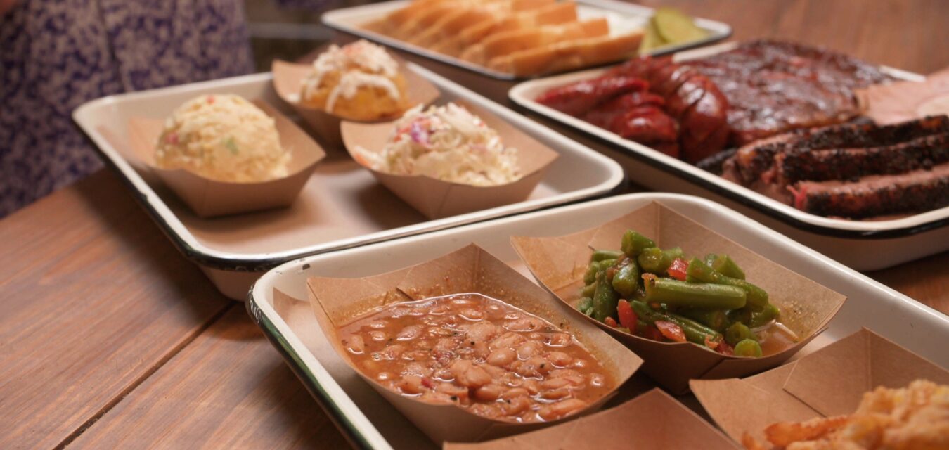 BBQ and sides on trays at Burnt Bean Co.