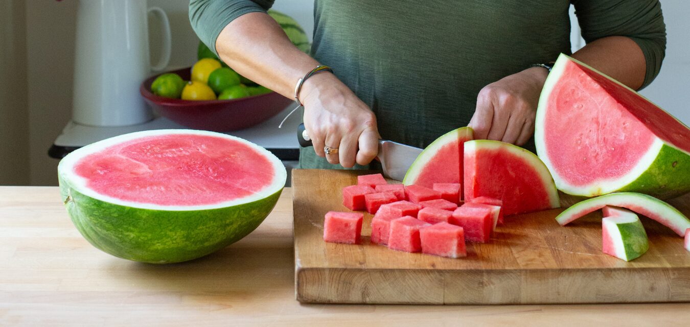 Virginia Willis cuts watermelon