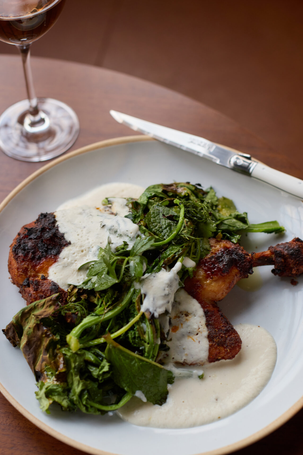 Chicken dish topped with greens at Judith Tavern in Sewanee, Tennessee