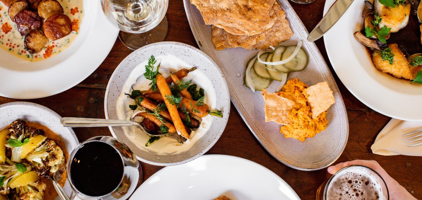 A variety of plated dishes in the restaurant at RT Lodge in Maryville, Tennessee