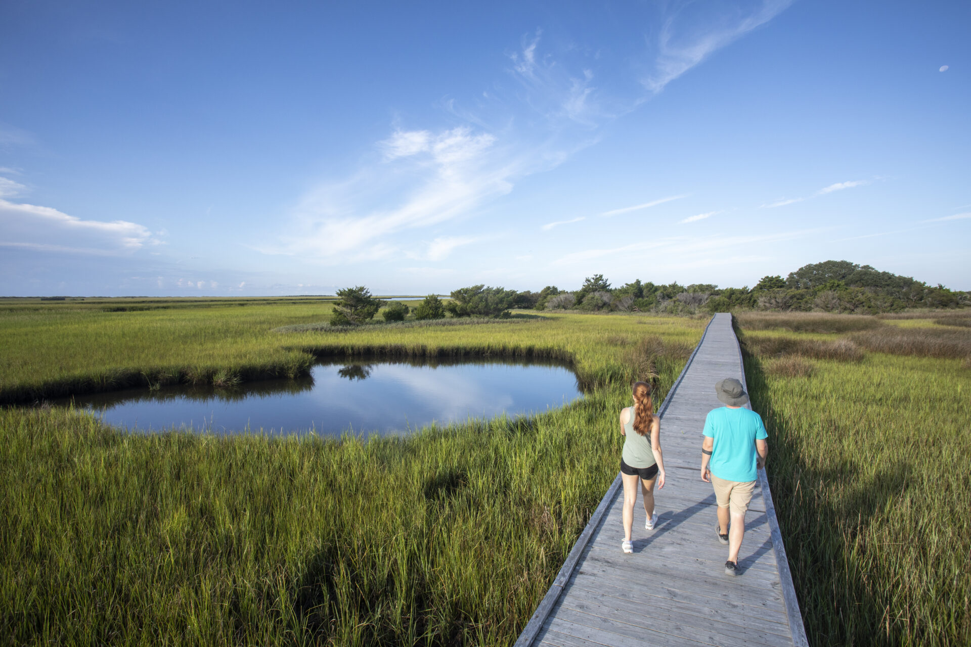 Couple walking on Basin Trail at Fort Fisher State Recreation Area Kure Beach NC
