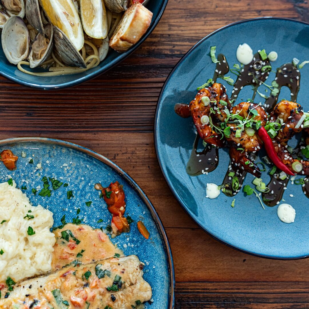 Islas on the Square table setting with food