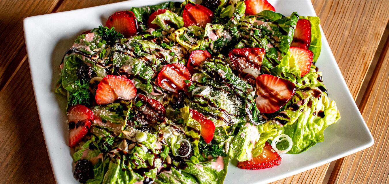Spring Strawberry Salad with Green Garlic recipe image courtesy of Brittany Furbee