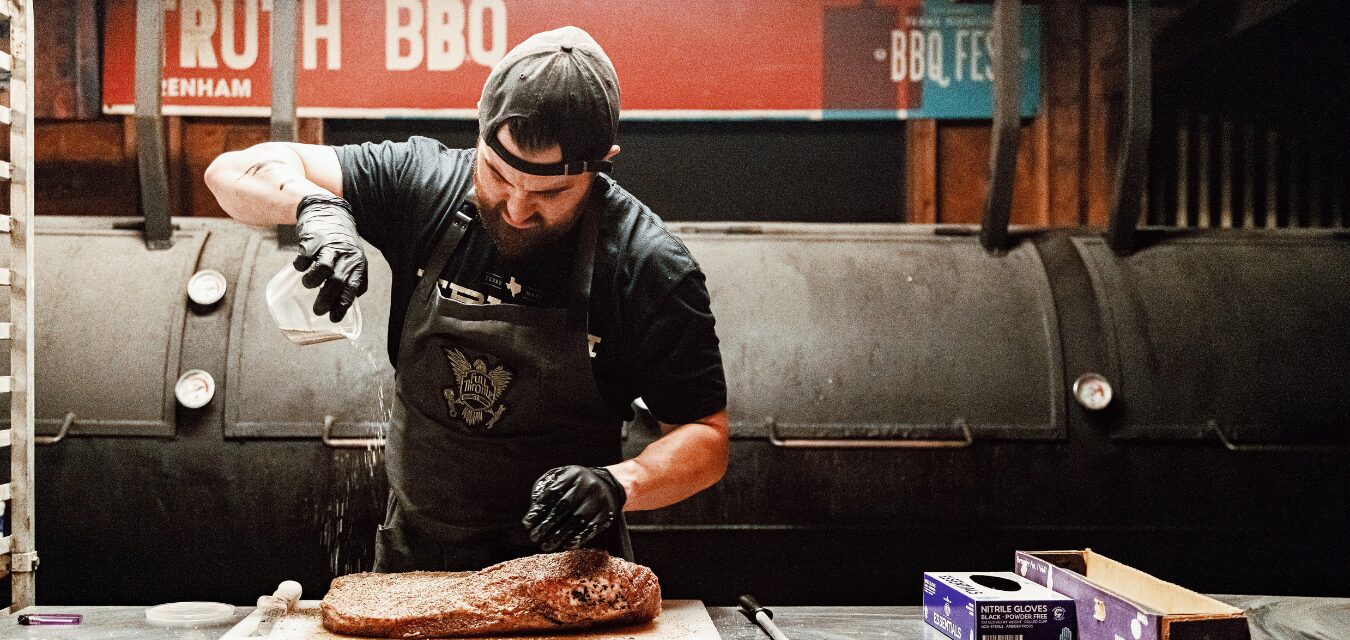 Leonard Botello seasoning a brisket Image courtesy of Ben Sassani