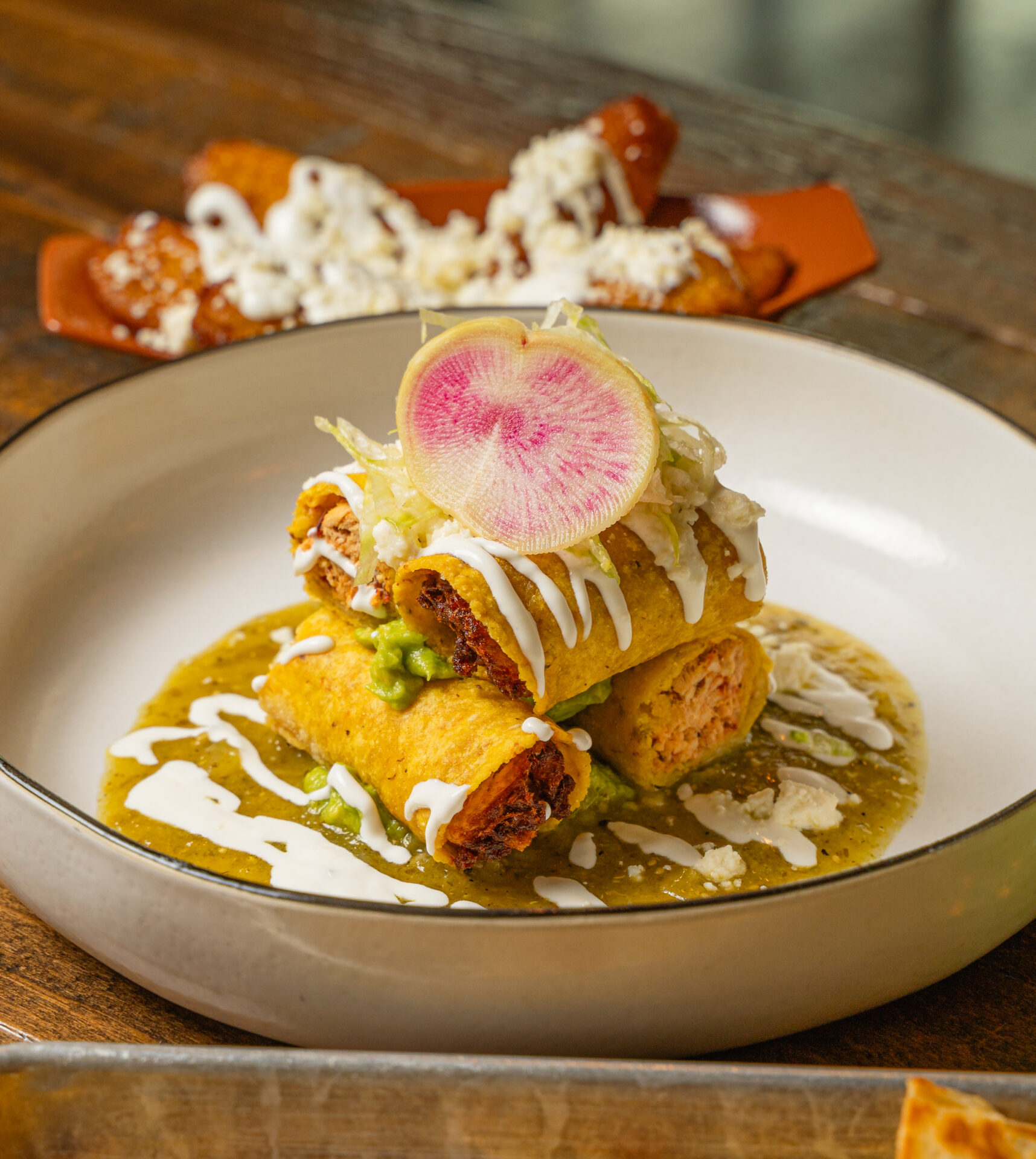 Chango Food Group Mal Pan Chicken Taquitos Photo by Camille Maede, courtesy of NiceDay